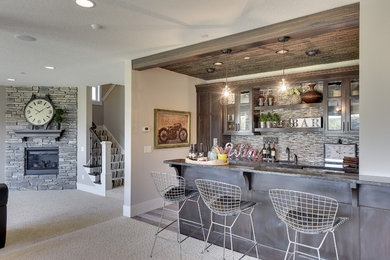 Inspiration for a large timeless carpeted and beige floor home bar remodel in Minneapolis with glass-front cabinets