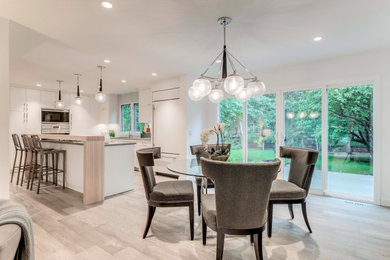 Example of a cottage home design design in Calgary