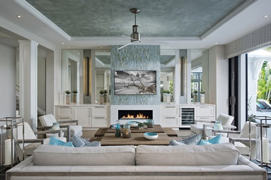 Huge beach style living room photo in Miami