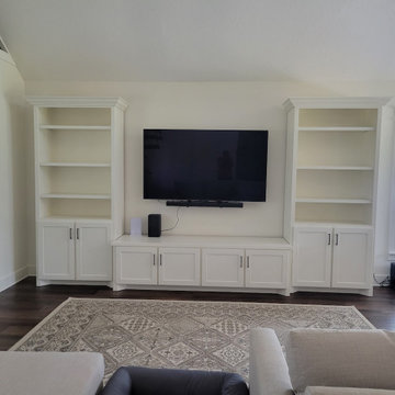 Custom White Shaker Wall Unit with Low Bench Cabinetry & Open Bookshelves