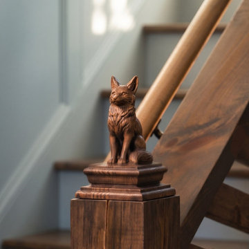 Curated Interior Detail: Detailed Wooden Fox Newel Post Finial