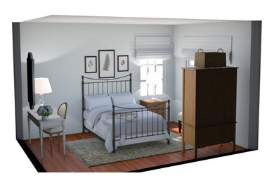 Modelo de habitación de invitados clásica renovada pequeña con paredes verdes y suelo de madera en tonos medios