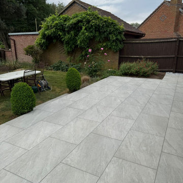 Porcelain Terrace Opening Out to Borders and Lawn