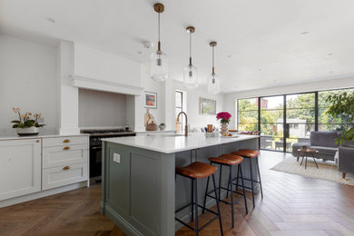 Design ideas for a transitional kitchen in Surrey.