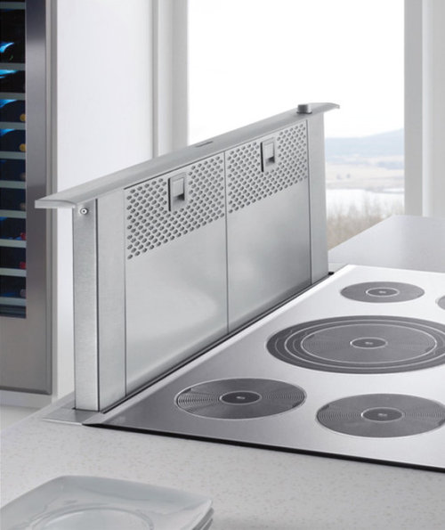 What's your experience with retractable downdraft vent holds?