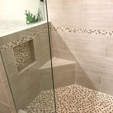 Custom bathroom remodel with Walk in shower and jet tub with grey tile surround