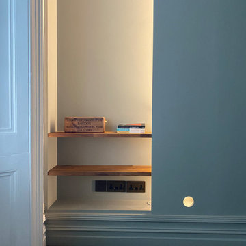 Glass walls, new shelving and lighting in W11