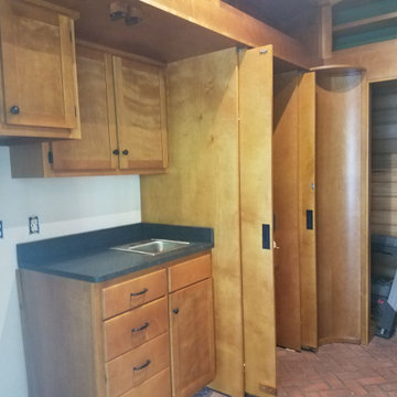 Paneled boardroom with hidden kitchen