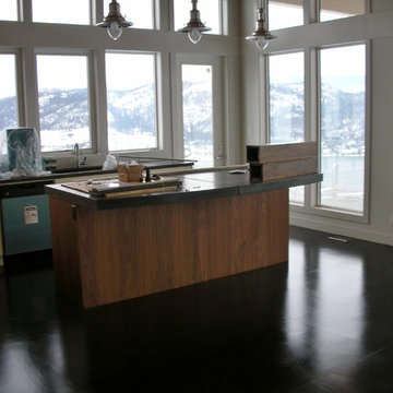 Modern Concrete Kitchen Countertops with Black Stained Concrete Floor