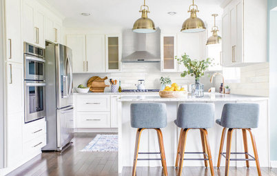 Kitchen of the Week: White, Brass and Blue in a G-Shaped Layout
