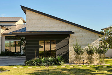 Transitional exterior home idea in Austin