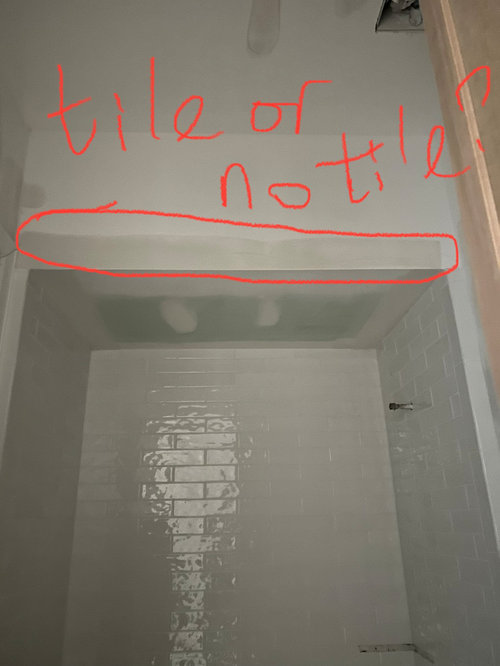 tile or not tile above the shower door frame