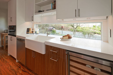 Inspiration for a kitchen remodel in Seattle with white backsplash and stainless steel appliances