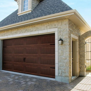 Mid-sized elegant detached two-car garage photo in Cedar Rapids