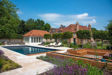 Design ideas for a large classic swimming pool in Sussex.