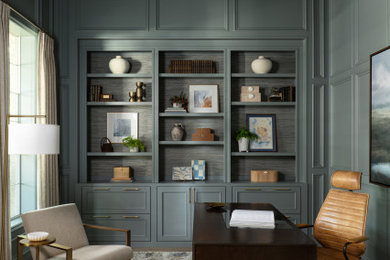Inspiration for a mid-sized transitional freestanding desk brown floor, coffered ceiling and wall paneling study room remodel in Houston with green walls