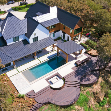 Waterfront deck with pool featuring Rustic Walnut composite decking