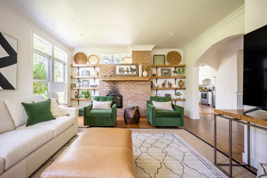 Example of a large cottage open concept light wood floor and beige floor living room design in New York with white walls, a two-sided fireplace, a brick fireplace and a tv stand