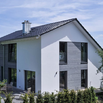 Satteldachhaus mit asymmetrischer Firstanordnung