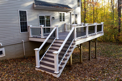 Mid-sized elegant backyard deck photo in Baltimore with no cover
