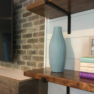 Fireplace wall remodel Before and After pictures