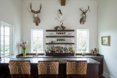 Inspiration for a transitional galley dark wood floor wet bar remodel in Austin with an undermount sink, shaker cabinets and dark wood cabinets