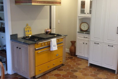Example of a farmhouse kitchen design in Other