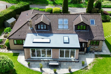 Contemporary house exterior in Other.