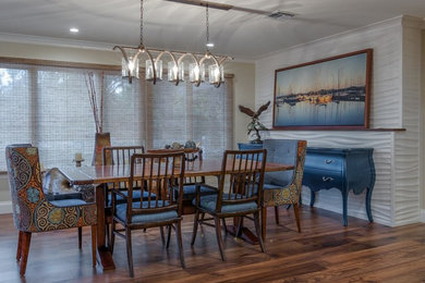 Example of a large eclectic medium tone wood floor and brown floor kitchen/dining room combo design in Tampa with beige walls