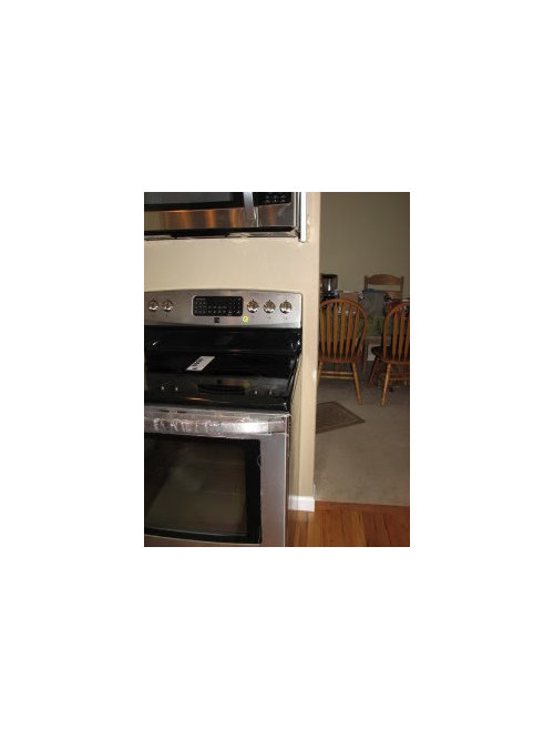 To Tile behind stove to floor? Quick Help! Pics