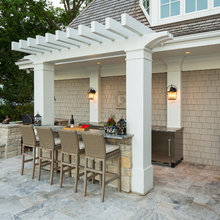outdoor kitchen with bars