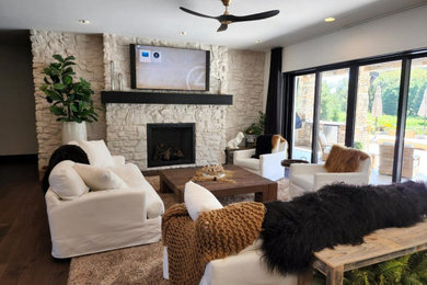 This is an example of a modern living room in Boise with a wall-mounted tv.