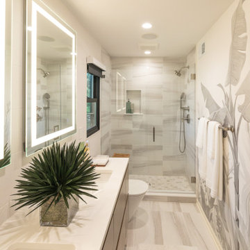Contemporary Primary and Hall Bath Remodels with Hotel-Inspired Design
