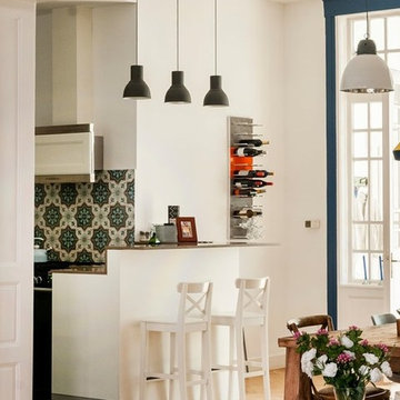 Scandi-modern kitchen with wine wall racks