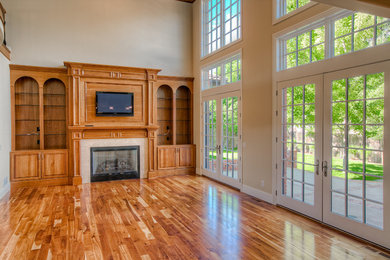 Elegant family room photo in Denver