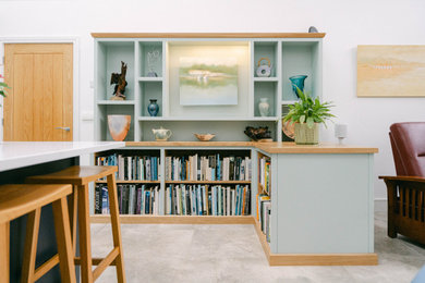 This is an example of a medium sized modern home office in Gloucestershire.
