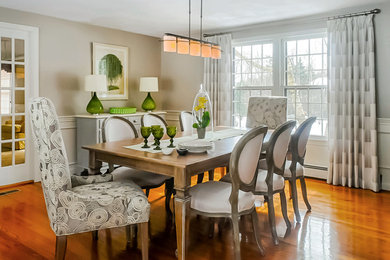 Design ideas for a mid-sized traditional separate dining room in Boston with grey walls and dark hardwood floors.