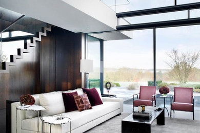 Inspiration for a contemporary open concept living room in London.