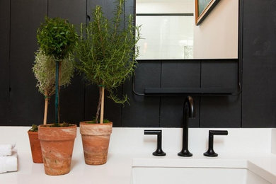 Example of a mid-sized eclectic master black tile porcelain tile and gray floor wet room design in Chicago with shaker cabinets, green cabinets, beige walls, an undermount sink, quartzite countertops and a hinged shower door