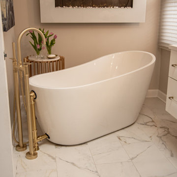 Curvy Soaking Tub with Wall-Mounted Fireplace