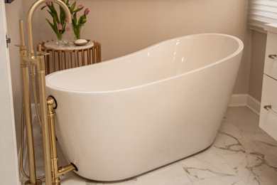 Example of a mid-sized trendy master white tile and porcelain tile porcelain tile, white floor, single-sink and vaulted ceiling bathroom design in Baltimore with flat-panel cabinets, white cabinets, a bidet, beige walls, an undermount sink, quartz countertops, a hinged shower door, white countertops, a niche and a floating vanity