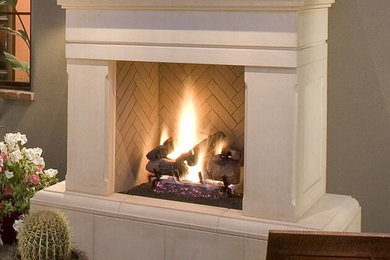 Mid-sized elegant open concept slate floor family room photo in Phoenix with beige walls, a standard fireplace and a stone fireplace