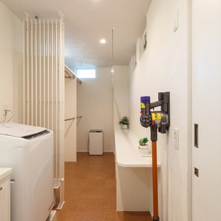 Inspiration for a medium sized modern single-wall utility room in Tokyo Suburbs with white walls, cork flooring, orange floors and white worktops.