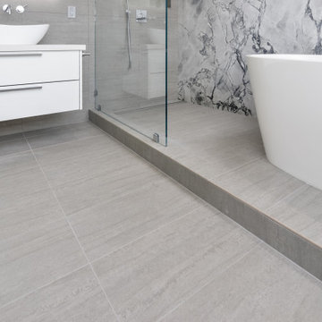 Contemporary Master Bathroom with striking features