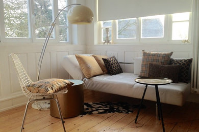 Family room - contemporary family room idea in Cologne
