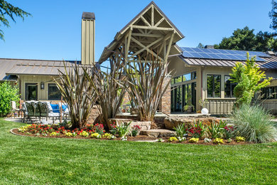Photo of a large transitional full sun front yard stone landscaping in San Francisco for summer.