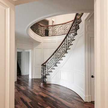 Project #74 | Circular Staircase with Hand-Forged Metal Panels