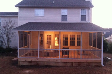 Minimalist beige two-story wood exterior home photo in Other