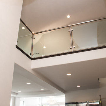 High Ceiling Conversion with Glass Railing