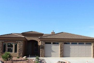 Example of a transitional exterior home design in Phoenix
